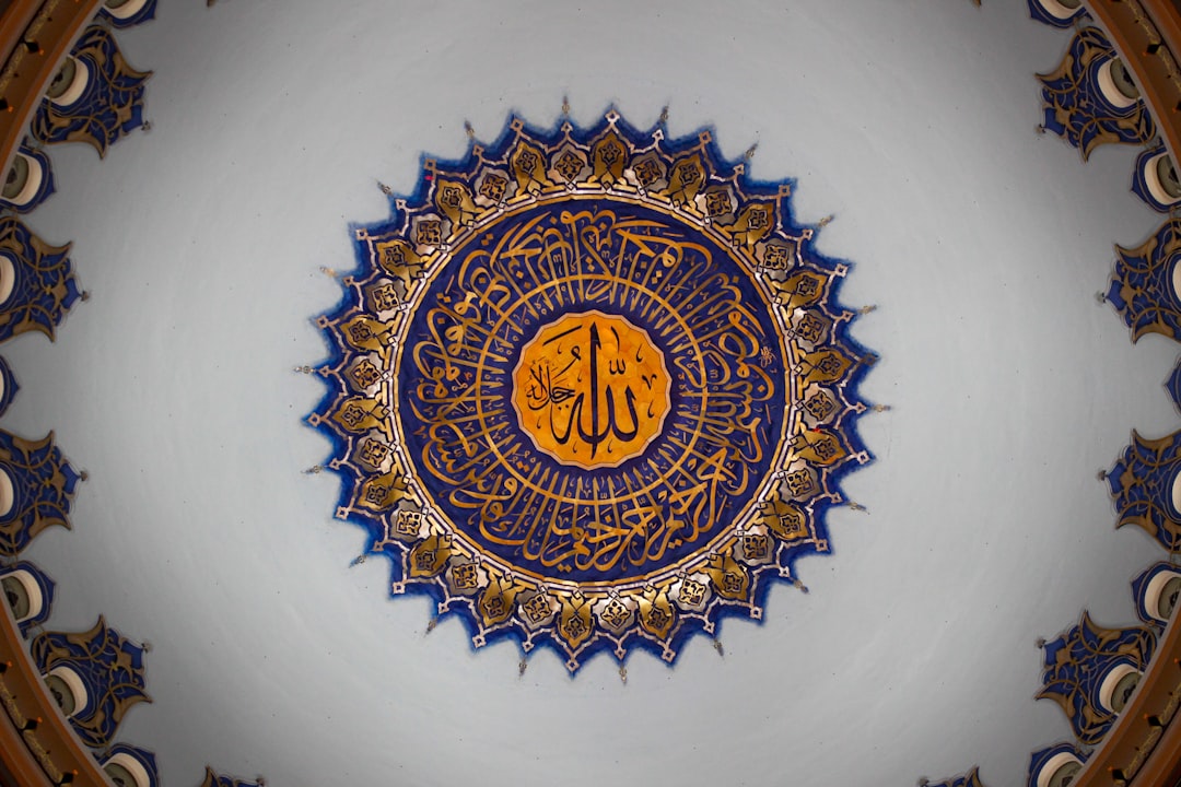 a-circular-ceiling-with-a-painting-on-it-3yicdzbidoe