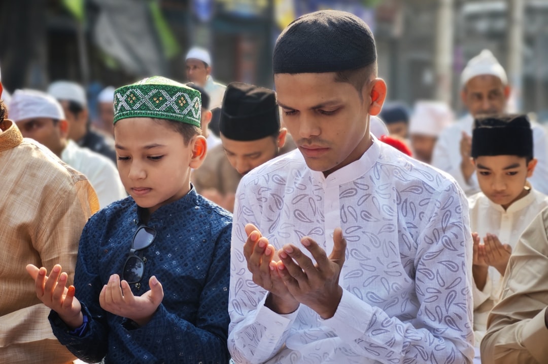 services-01 a-group-of-men-standing-next-to-each-other-zadqim8oua0